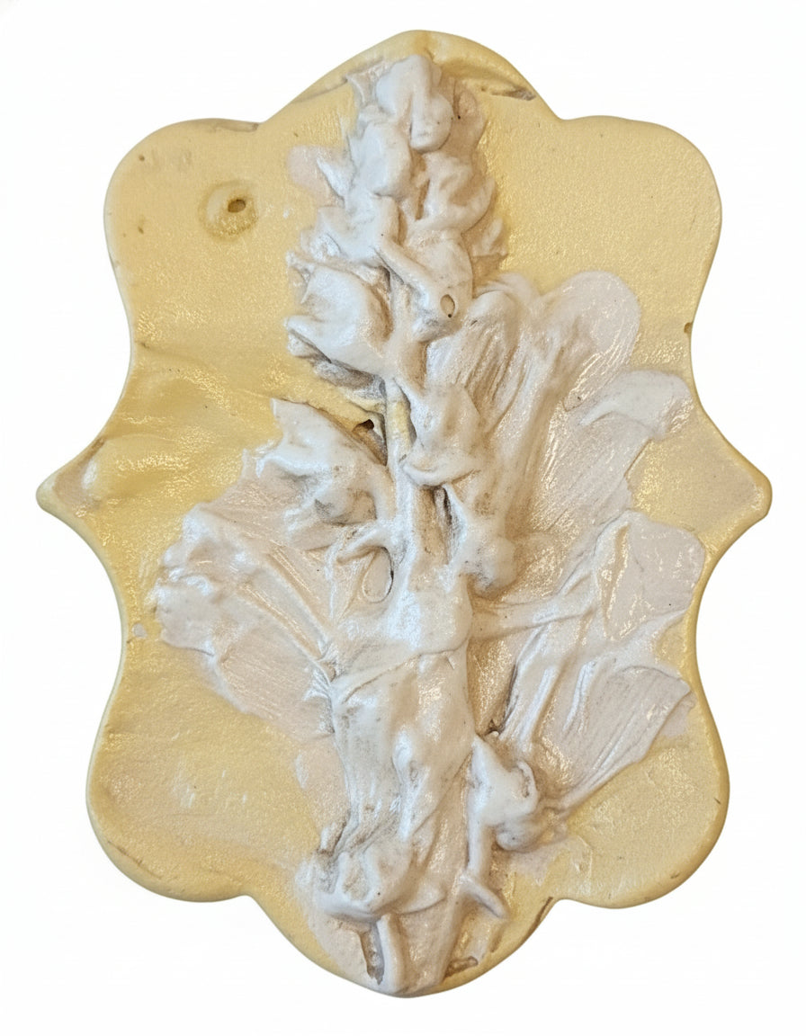 Victorian shaped plaster cast of Snapdragon on a decorative wood plaque in off white finish
