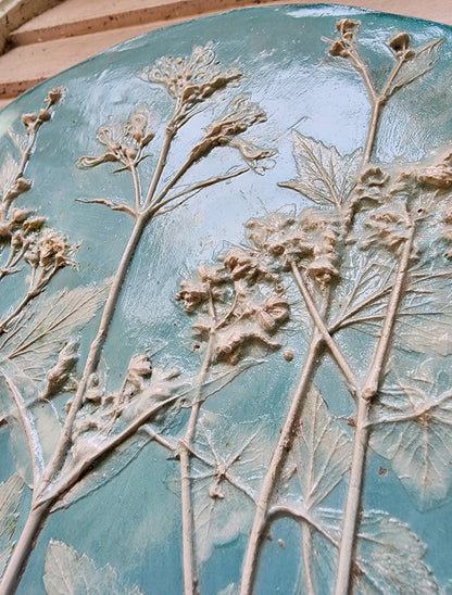 View of the bas relief of the botanical plaster cast as viewed from below.