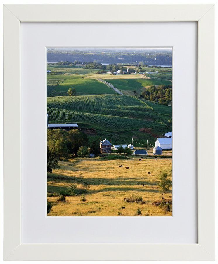 Framed picture of a rural iowa landscape with fields and buildings in the upper Mississippi river floodplain