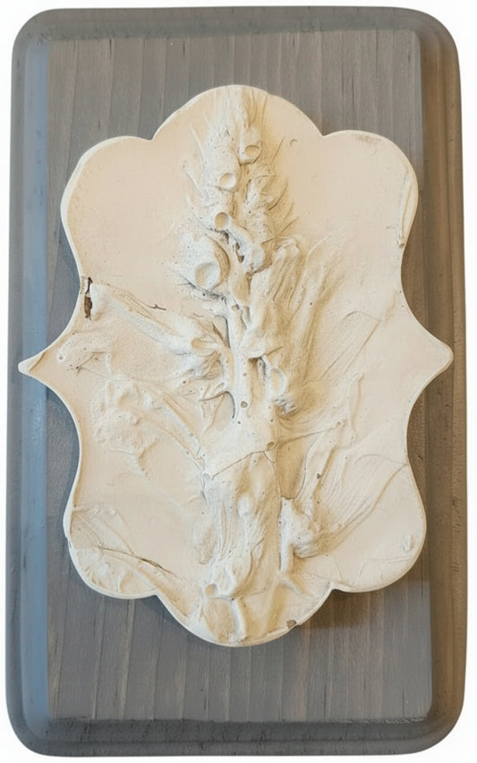 Victorian shaped plaster cast of Snapdragon on a decorative wood plaque in blue-gray finish 