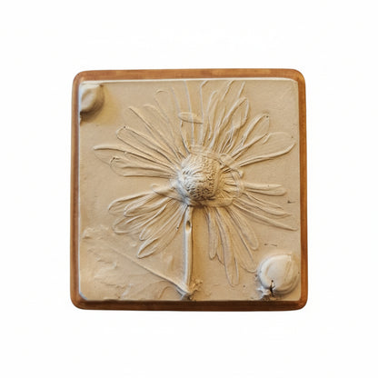Square plaster cast of flowers mounted on an oak stained wood plaque