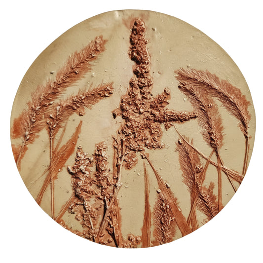 Round plaster Artwork featuring foxtail and amarathus seedheads 