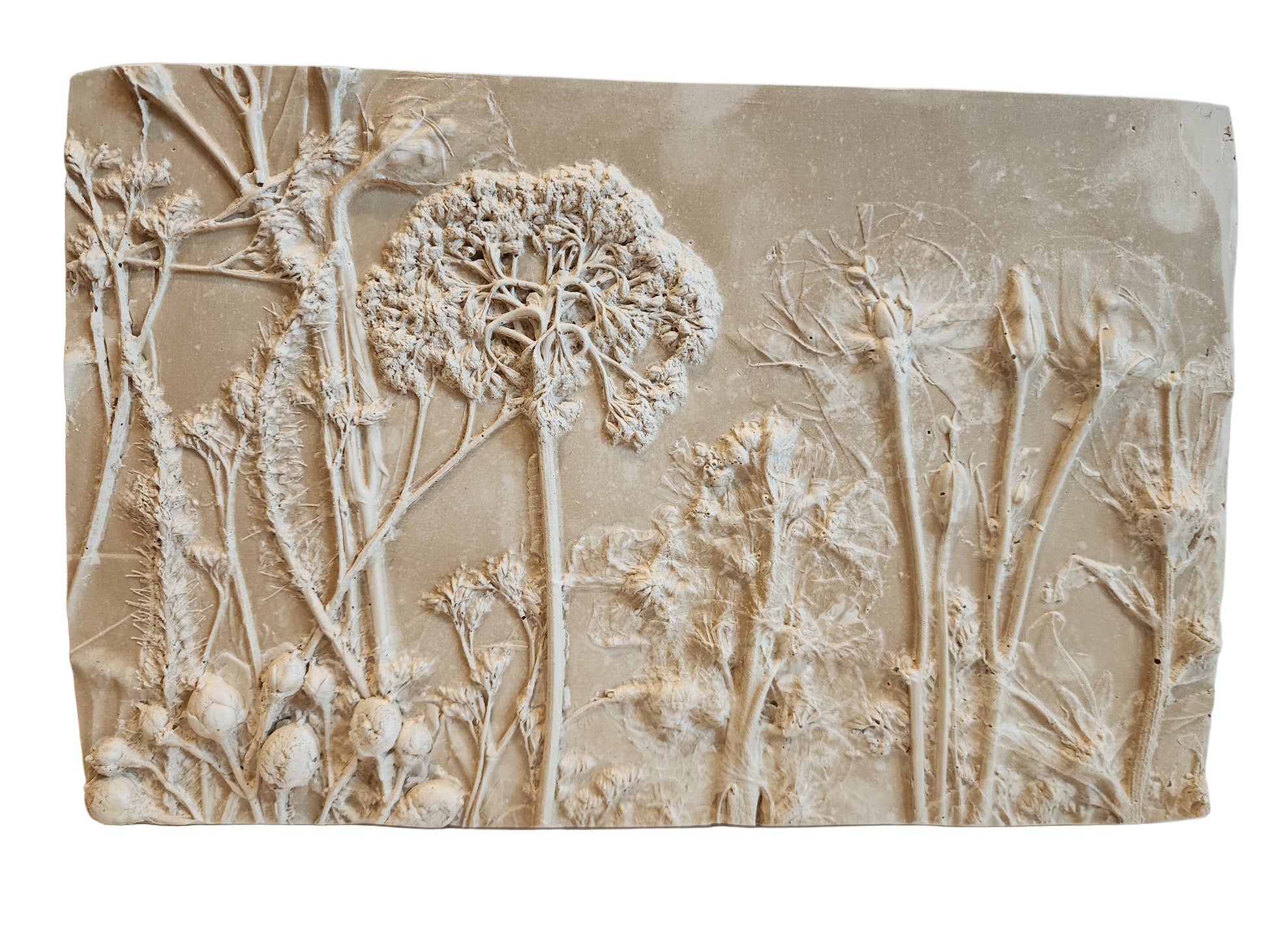 Front view of decorative wall art with bas relief floral design on a beige background.  