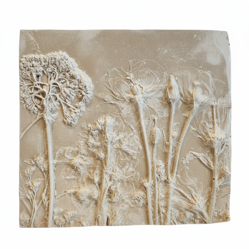 Right side closeup photo. Relief sculpture with intricate details on a beige background